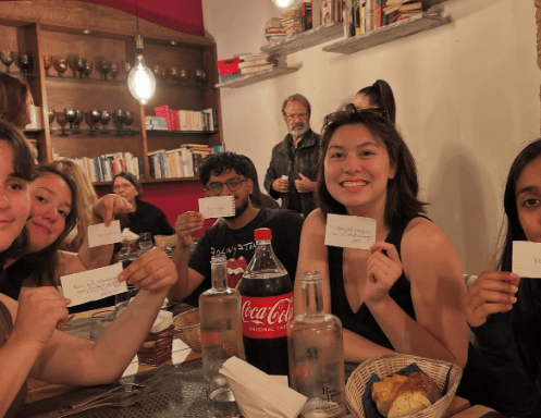 students having dinner in rome